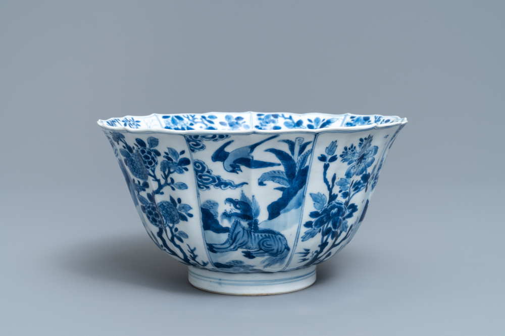 A Chinese blue and white bowl with mythical beasts and flowers, Kangxi