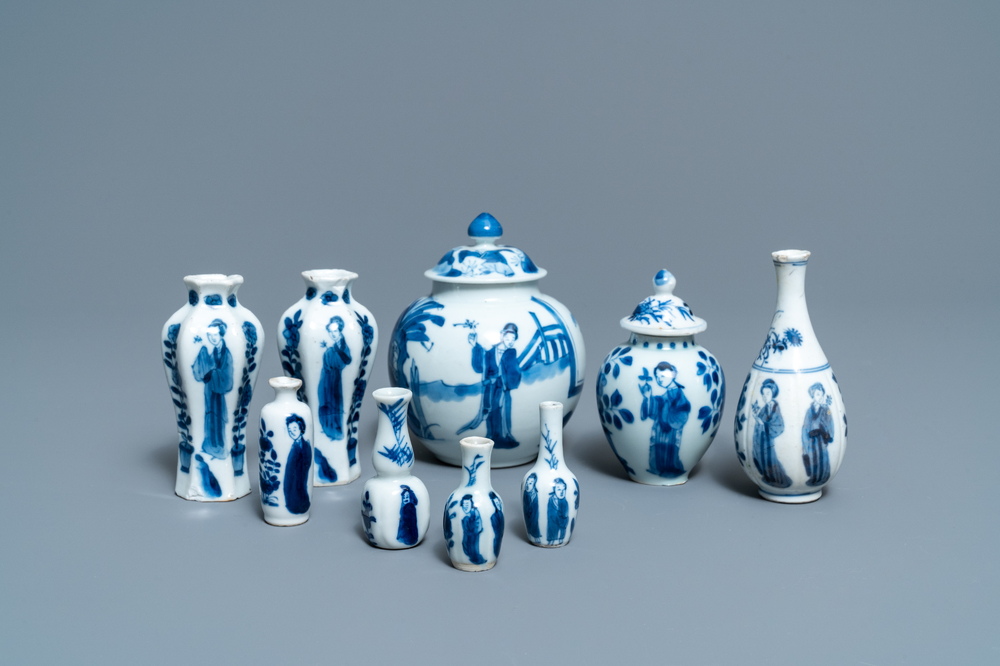 Nine small Chinese blue and white 'Long Eliza' vases, Kangxi
