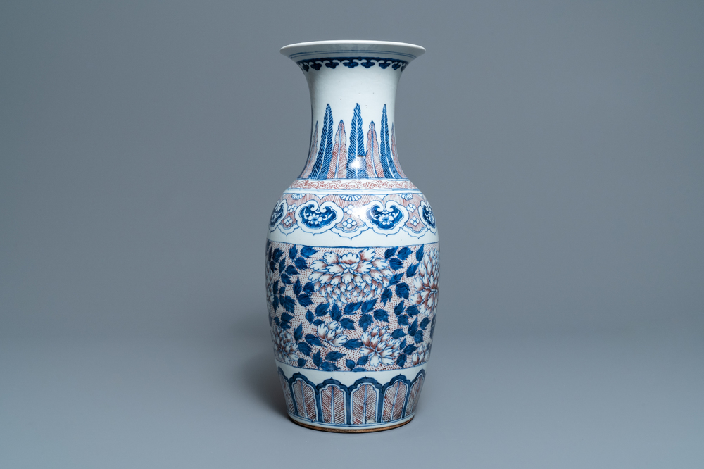 A Chinese blue, white and underglaze red vase, 19th C.