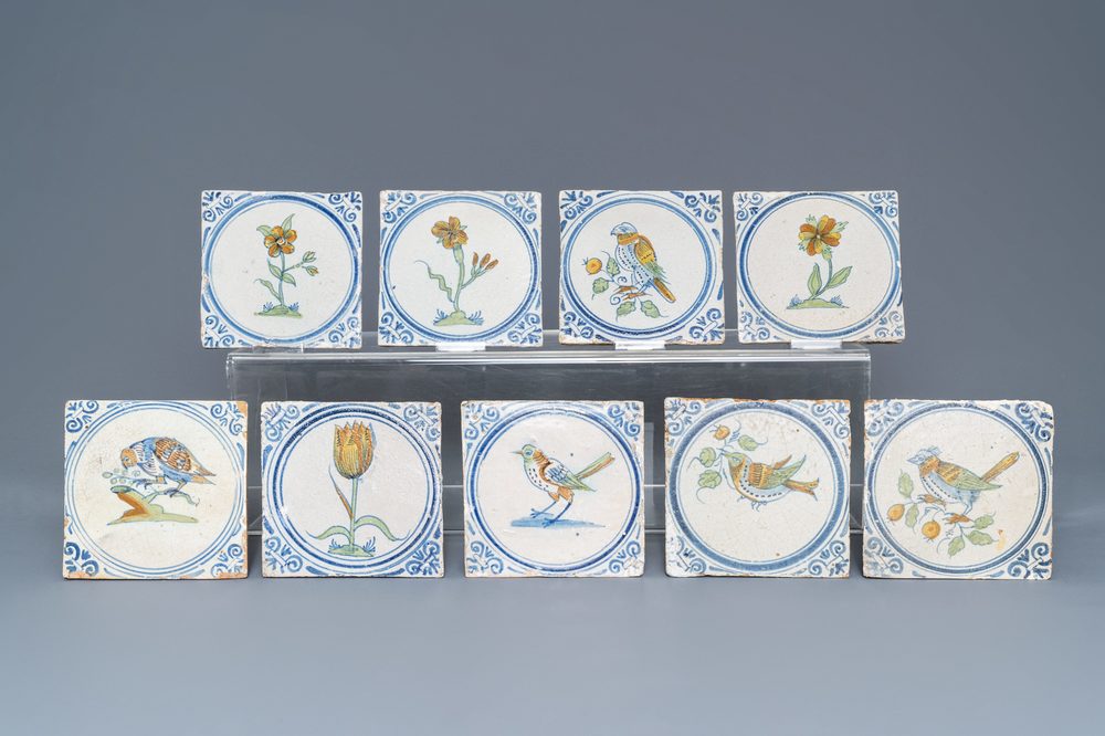 Nine polychrome Dutch Delft tiles with birds and flowers, 17th C.