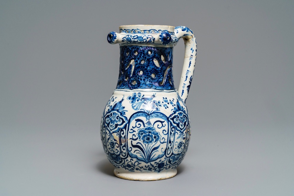 A Dutch Delft blue and white puzzle jug, dated 1737