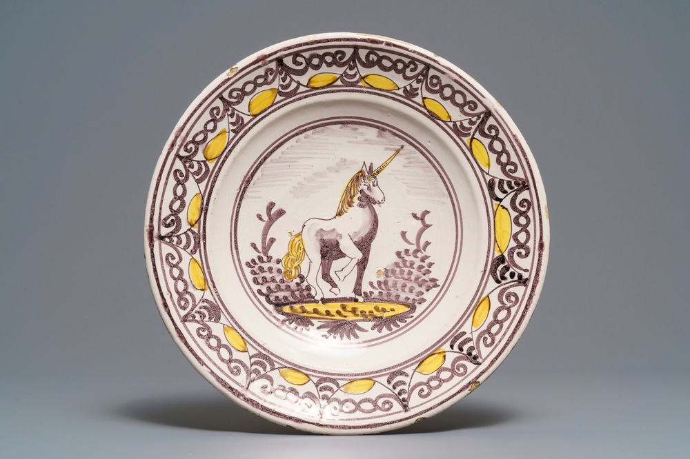A yellow and manganese maiolica 'unicorn' dish, Delft or Friesland, 17/18th C.