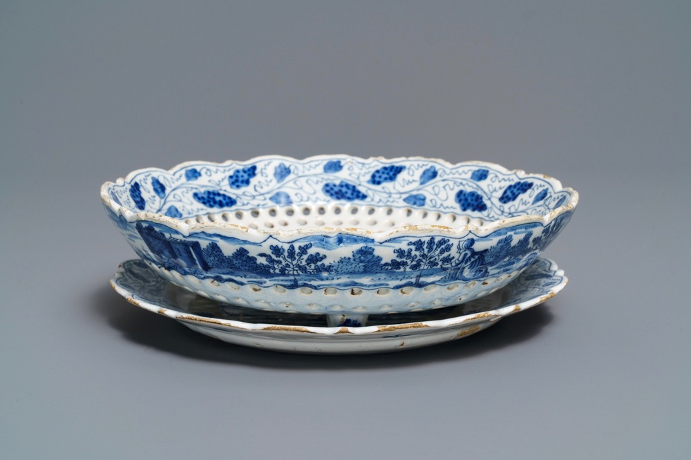 A Dutch Delft blue and white strawberry strainer on stand, 18th C.