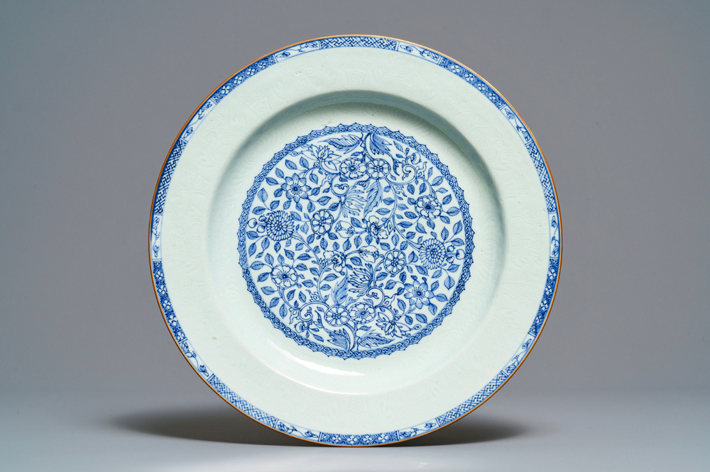 A Chinese blue and white dish with incised rim, Kangxi