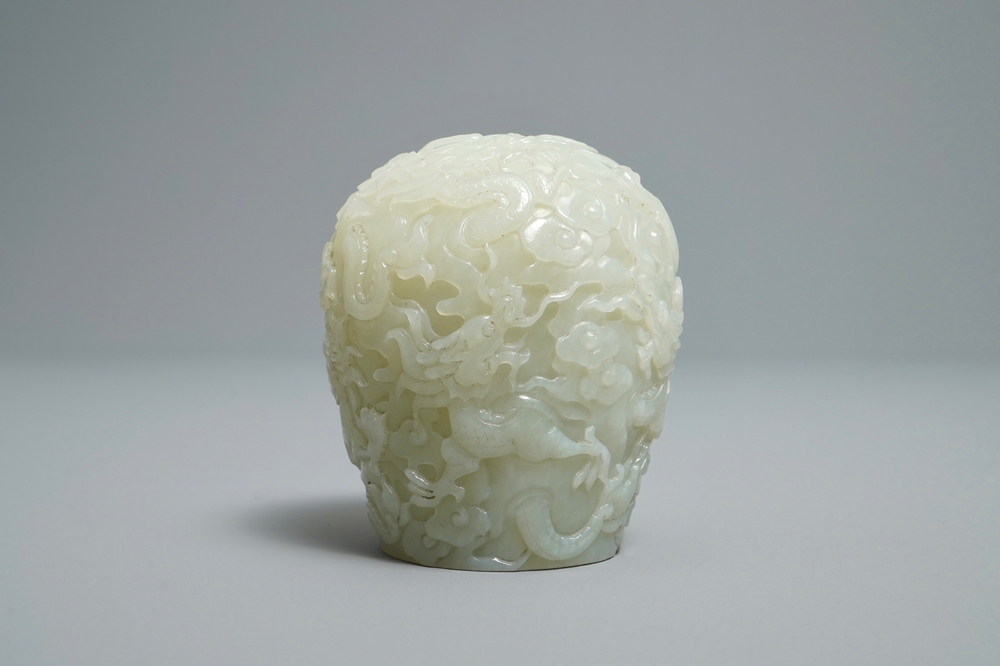 A Chinese celadon jade 'dragon' finial for a stupa, 19/20th C.
