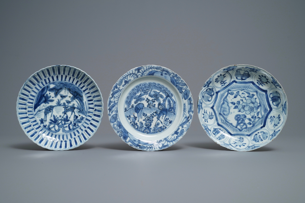 Three Chinese blue and white kraak porcelain 'deer' and 'prunus' plates, Wanli