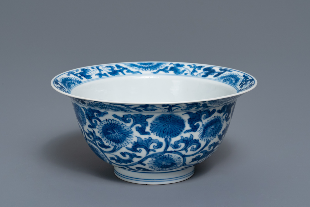 A Chinese blue and white bowl with floral scrolls, Kangxi