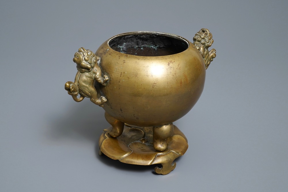 A large Chinese bronze tripod censer on stand, 19th C.