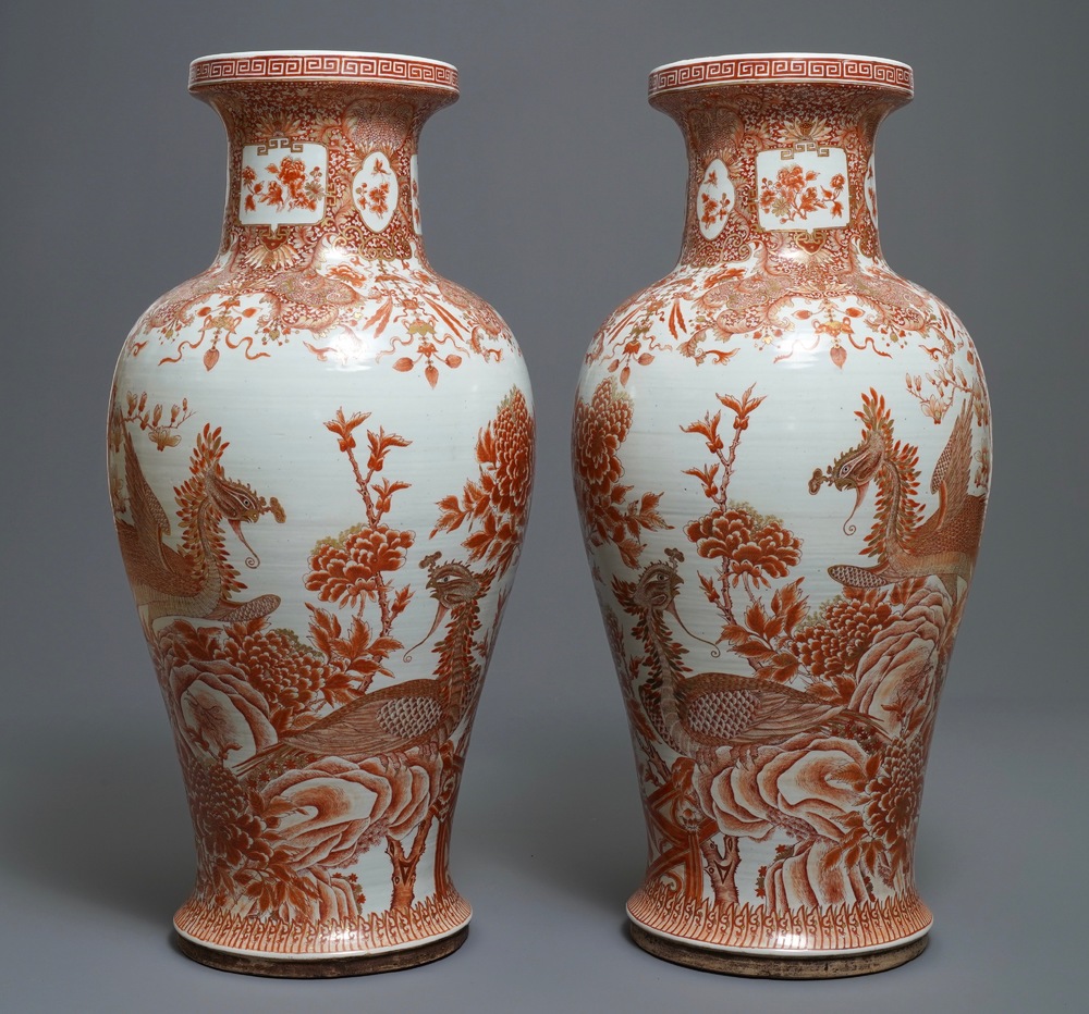 A pair of large Chinese iron red and gilt 'phoenixes' vases, Qianlong