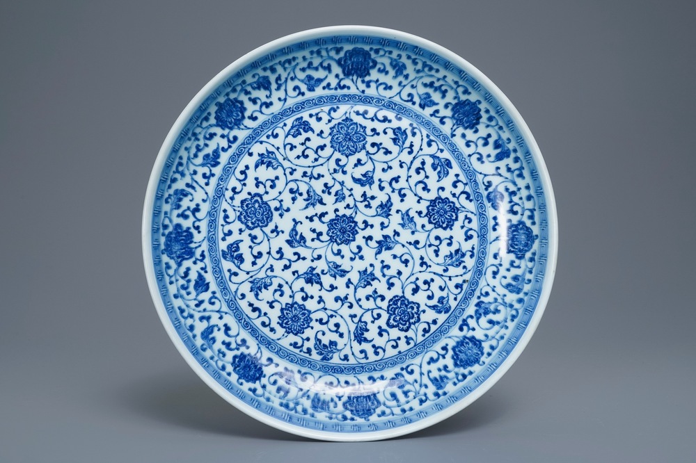 A Chinese Ming-style blue and white 'floral scroll' dish, Qianlong