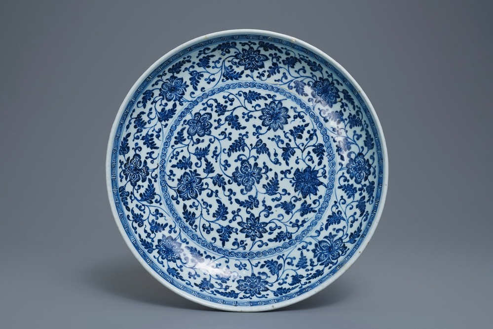A Chinese Ming-style blue and white 'floral scroll' dish, Qianlong