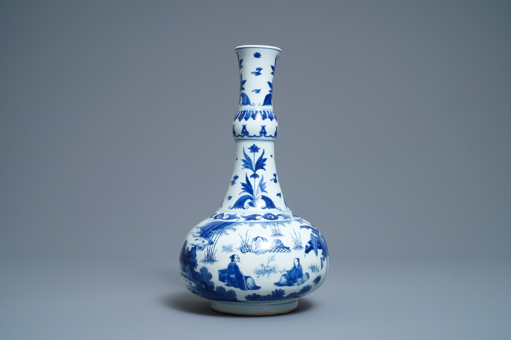 A Chinese blue and white bottle vase with figures in a landscape, Transitional period