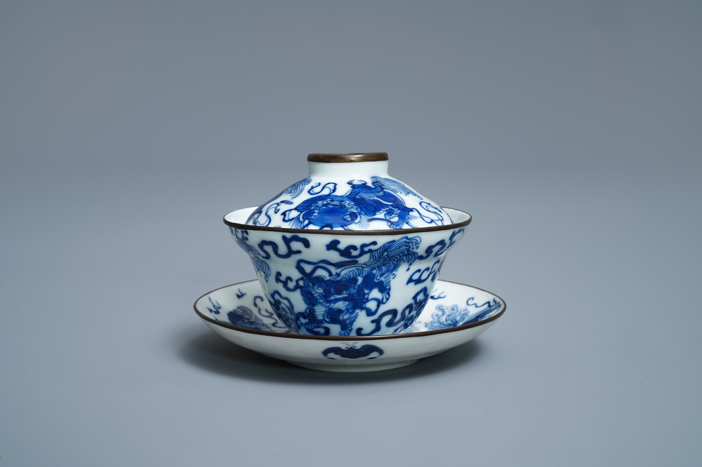 A Chinese blue and white Vietnamese market 'Bleu de Hue' covered bowl and saucer, 19th C.
