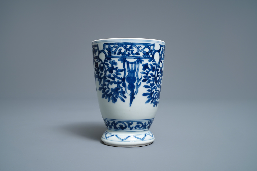 A Chinese blue and white beaker after a European silver model, Kangxi