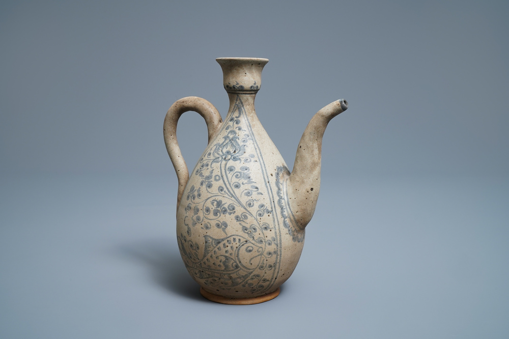 An Annamese blue and white jug with fish and lotus scrolls, Vietnam, 15/16th C.