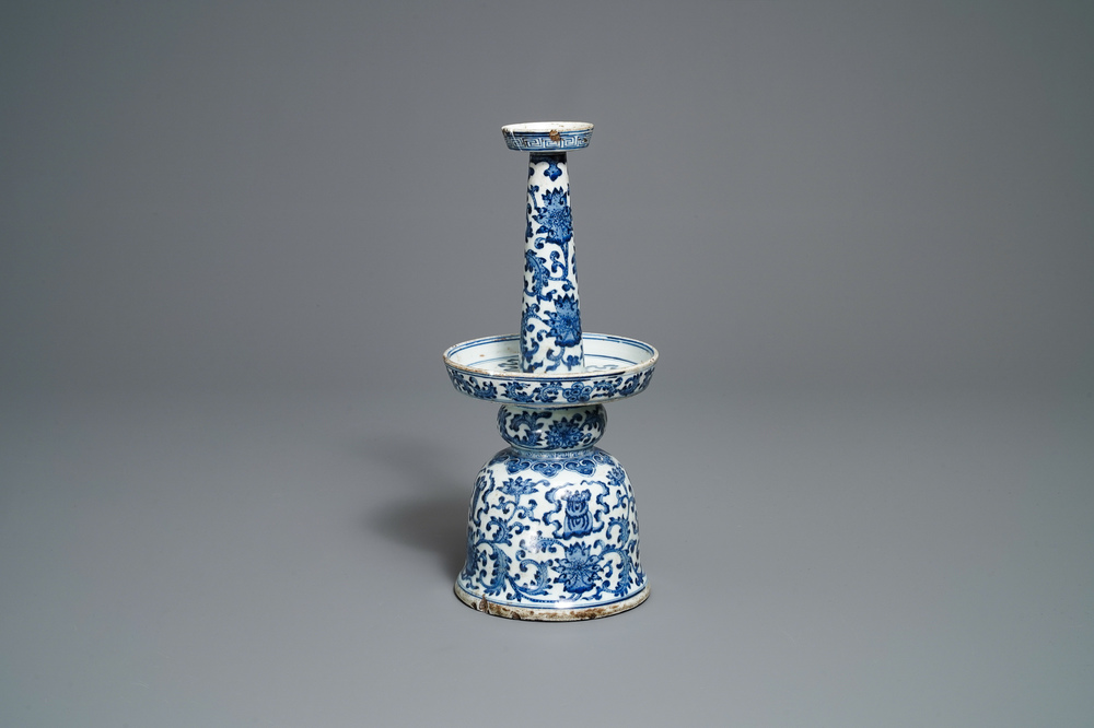 A large Chinese blue and white candleholder with floral design, Qianlong/Jiaqing