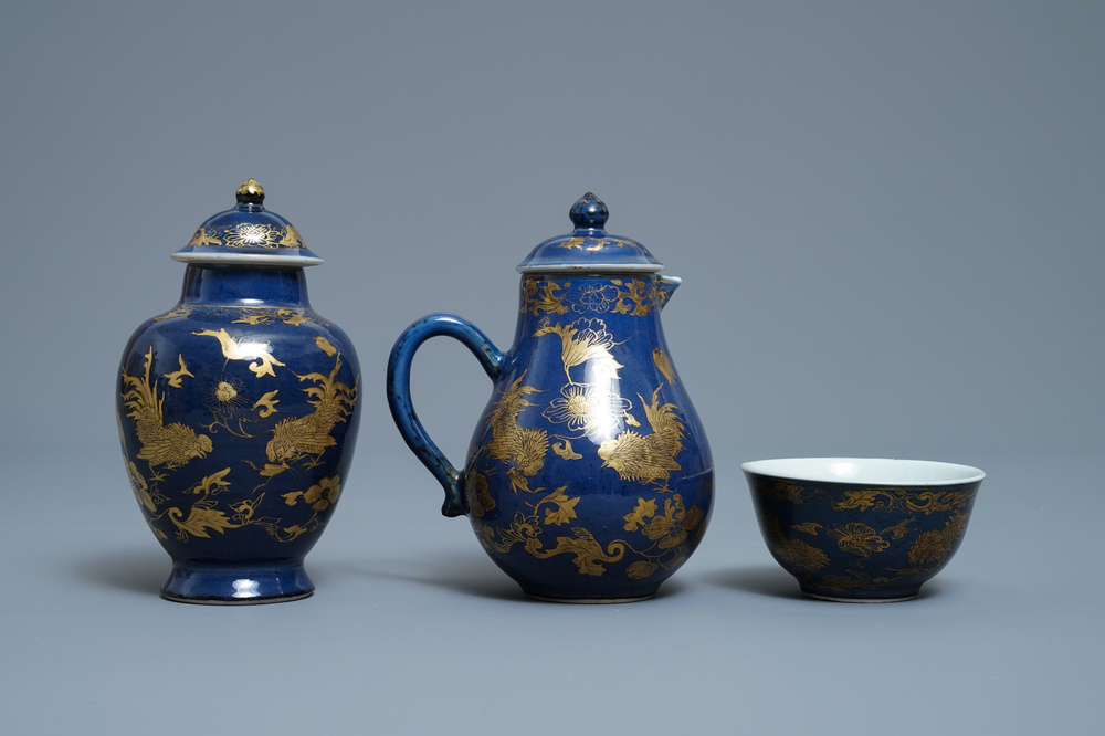 A Chinese gilt-decorated powder blue cream jug, a tea caddy and a tea bowl with roosters, Yongzheng