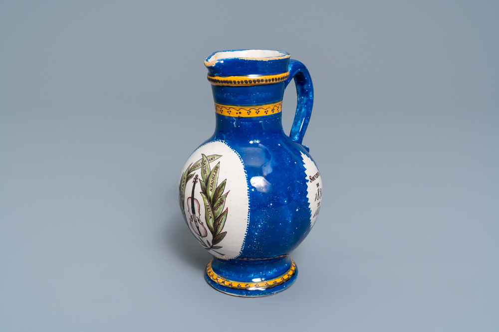 A polychrome Brussels faience commemorative 'musical design' jug, 19th C.