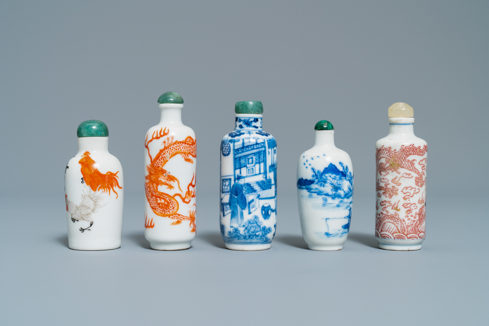 Five Chinese blue and white, iron- and copper-red snuff bottles, 19th C.