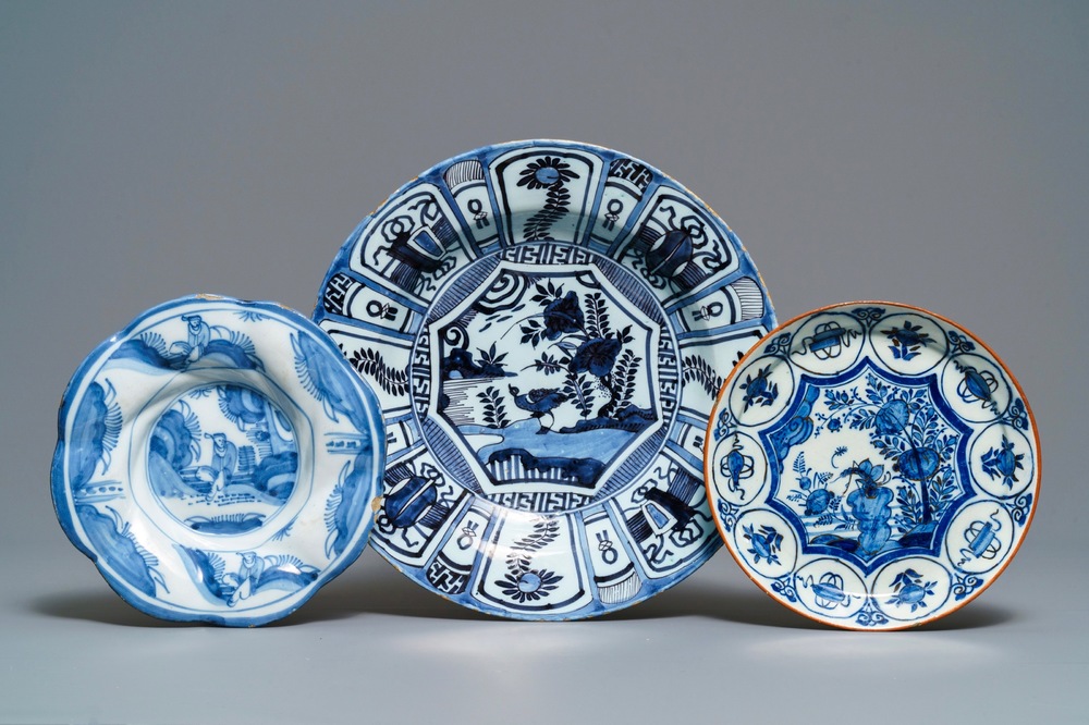 Two Dutch Delft blue and white chinoiserie plates and a dish, 17/18th C.