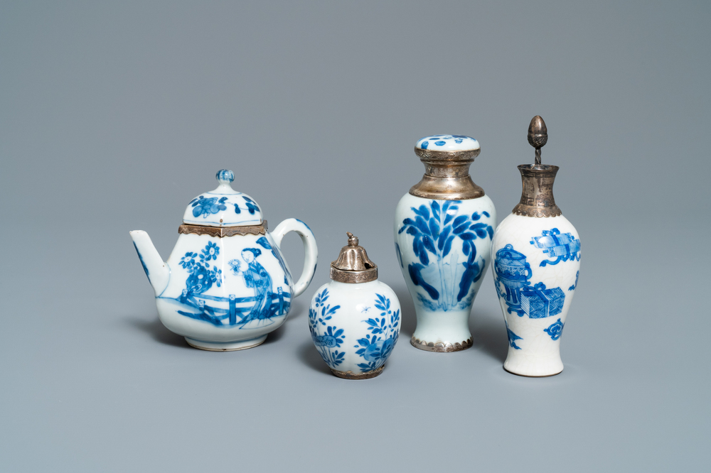 Three Chinese silver-mounted blue and white vases and a teapot, Kangxi