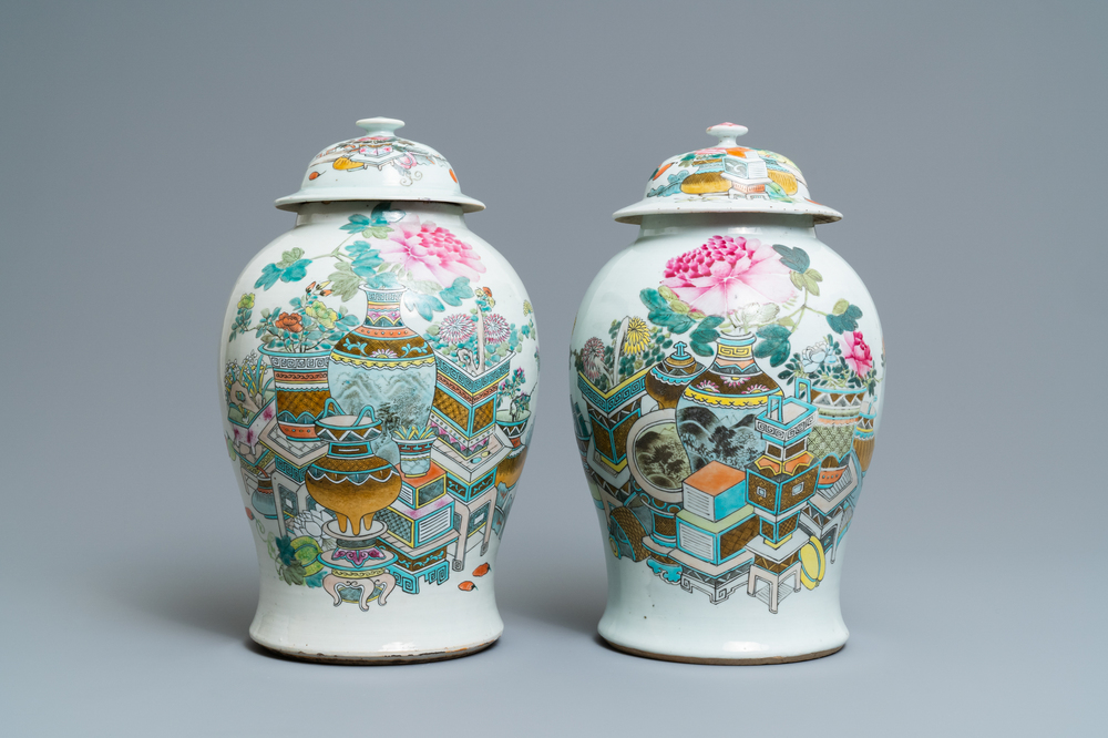 Two Chinese qianjiang cai vases and covers with antiquities, 19th C.