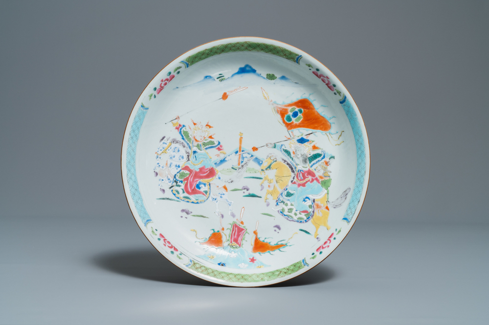 A Chinese famille rose dish with warriors on horseback, Qianlong