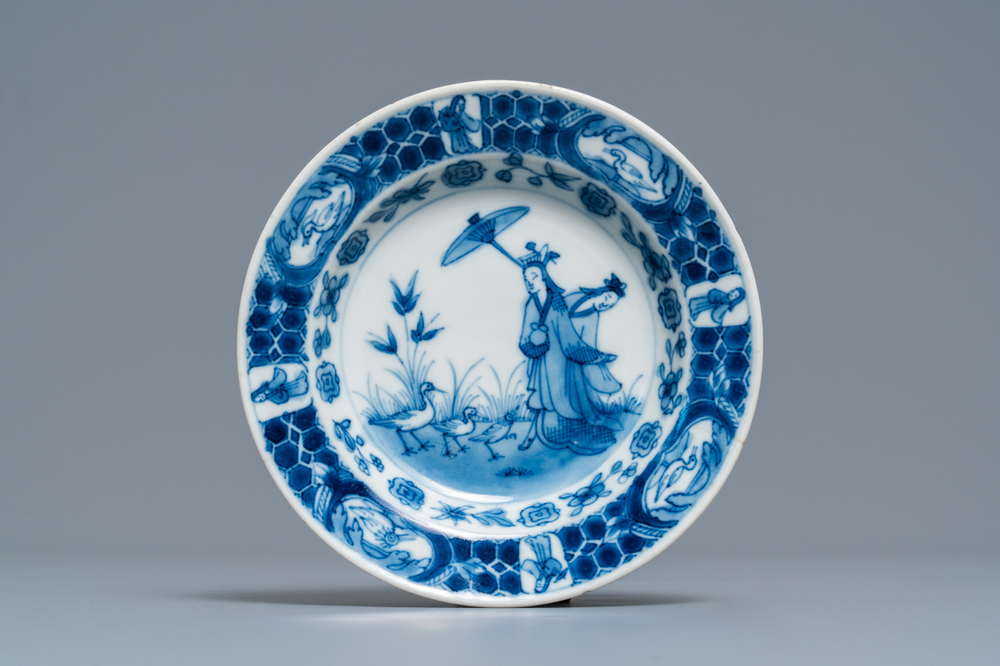 A Japanese blue and white Arita dish after Cornelis Pronk: 'Dames au Parasol', Edo, 18th C.