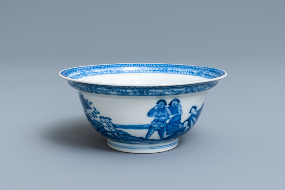 A Chinese blue and white bowl with an unusual scene with slaves, Qianlong