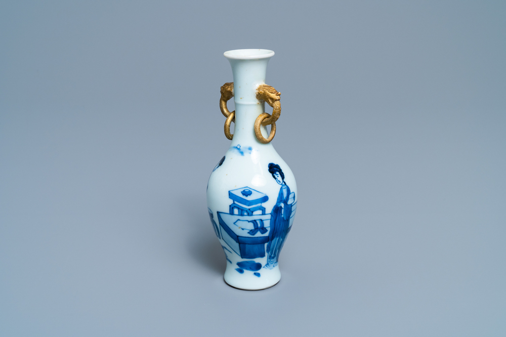 A Chinese blue and white vase with gilt elephant-head handles, Kangxi