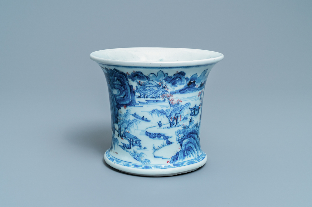 A fine Chinese blue, white and copper red 'Master of the Rocks' brush pot, Kangxi