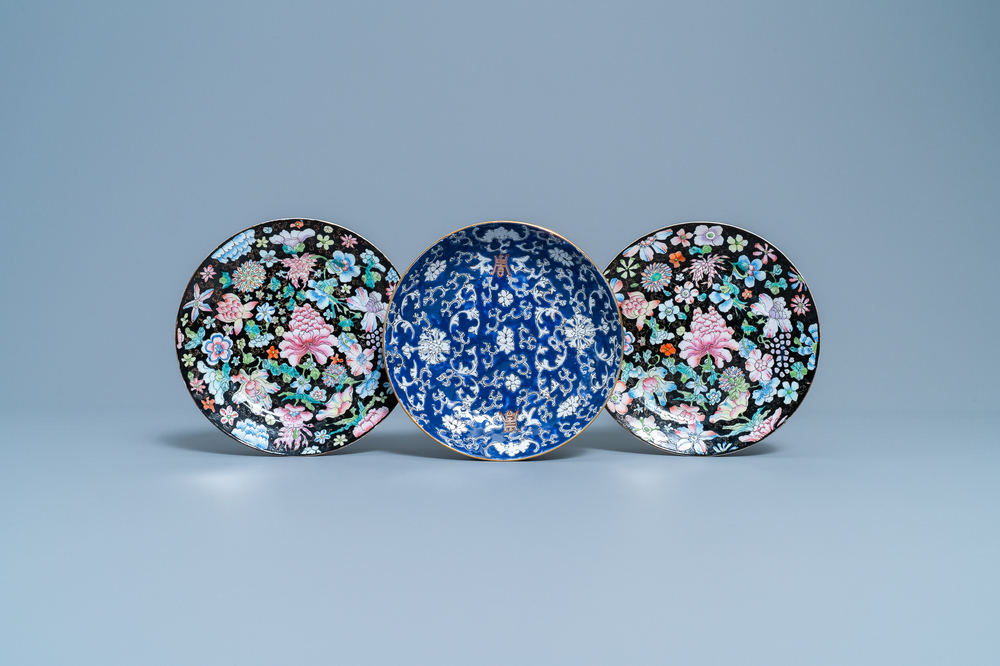 A pair of Chinese famille rose 'millefleurs' plates and a blue-ground plate, 19/20th C.