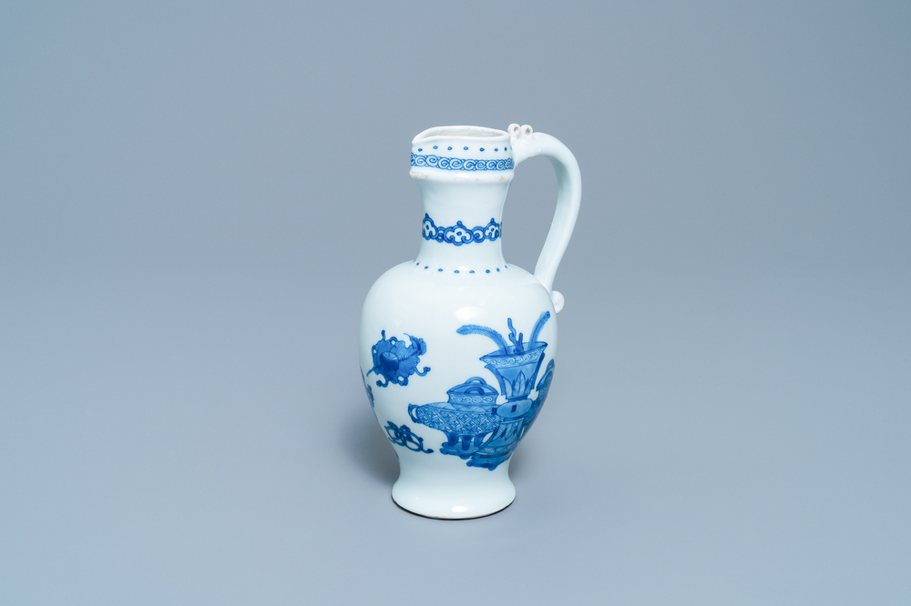 A Chinese blue and white 'antiquities' ewer, Kangxi