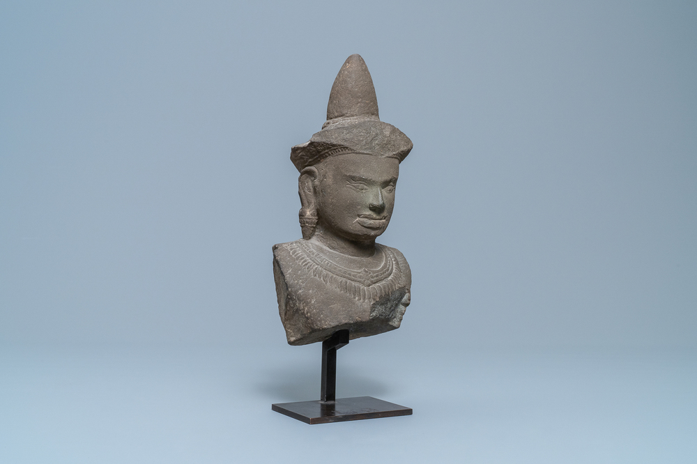 A grey sandstone bust of vishnu, Cambodia, Khmer, Angkor Wat period, 12th C.