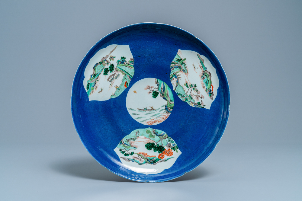 A Chinese famille verte powder blue-ground dish, 19th C.