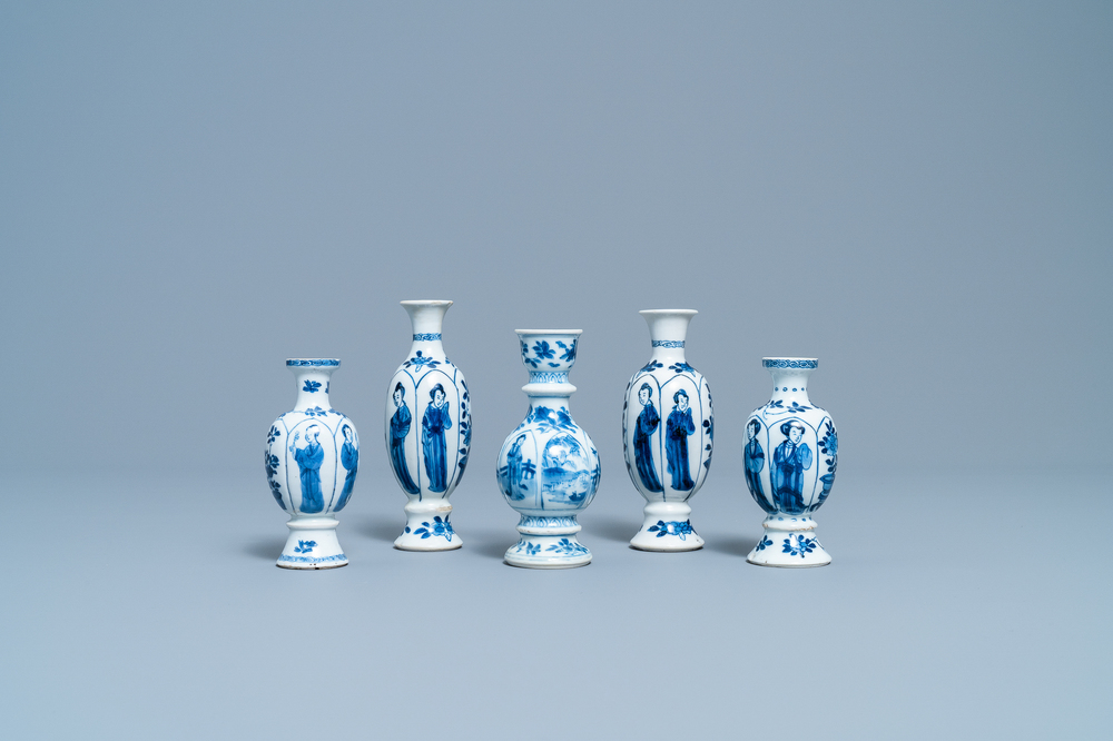 Four Chinese blue and white miniature vases and a huqqa base, Kangxi