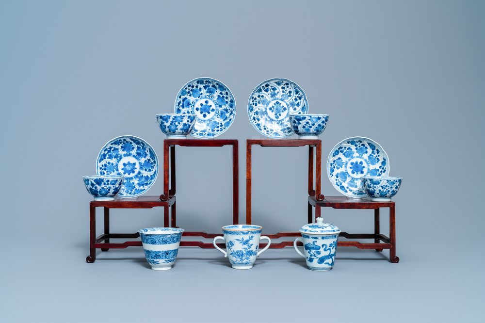 Four Chinese blue and white cups and saucers and three large cups, Kangxi/Qianlong