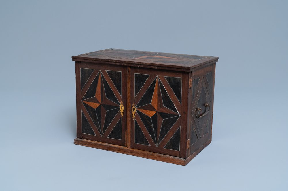 A Dutch wood marquetry and bone inlay table cabinet, 17th C.