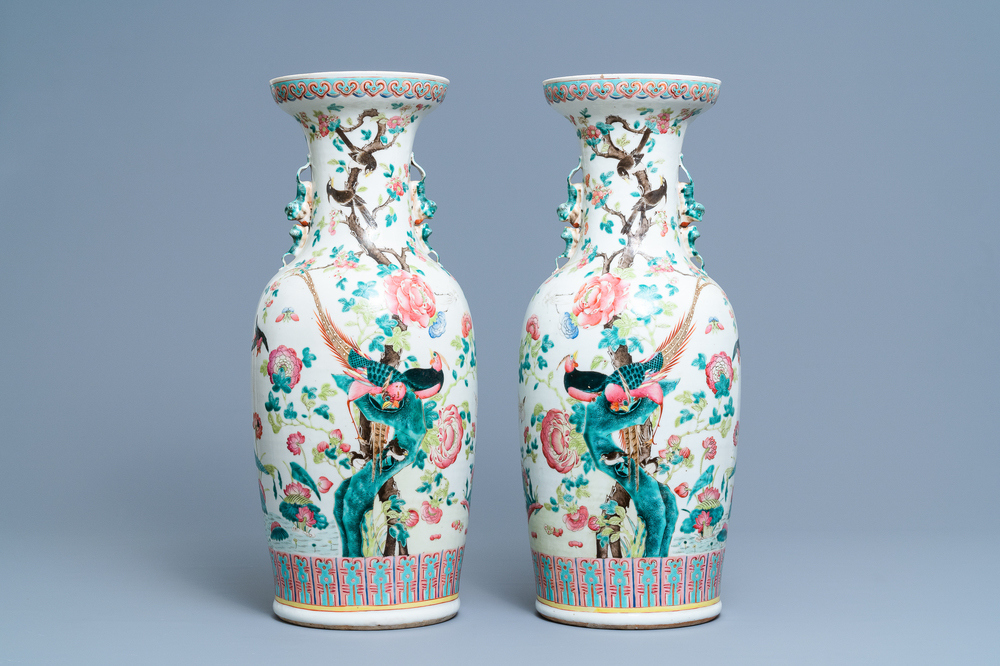 A pair of Chinese famille rose vases with birds among blossoming branches, 19th C.