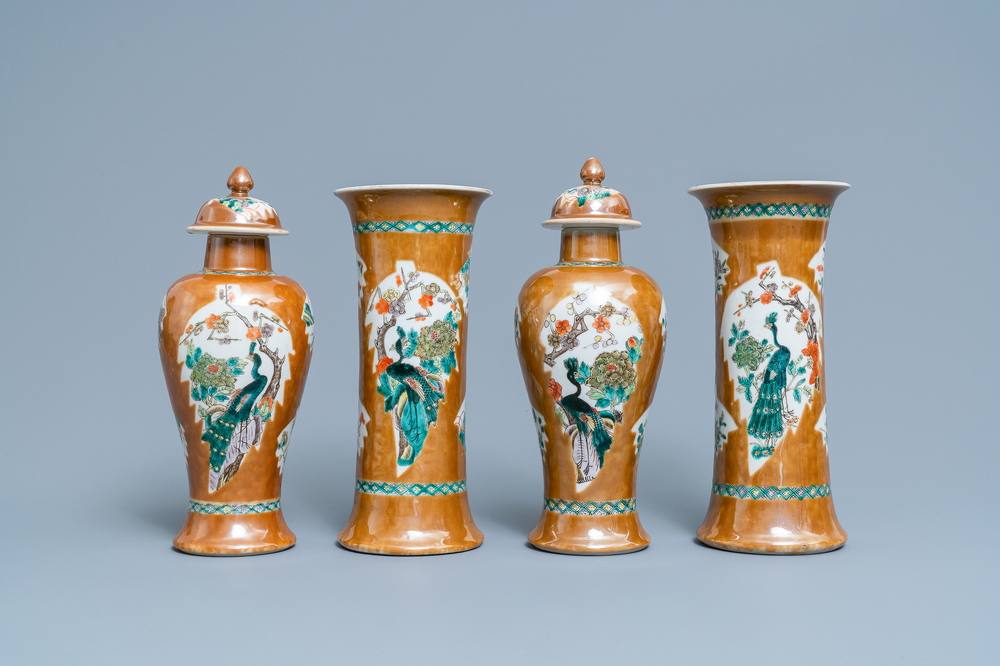 A Chinese famille verte capucin brown-ground four-piece garniture, 19th C.