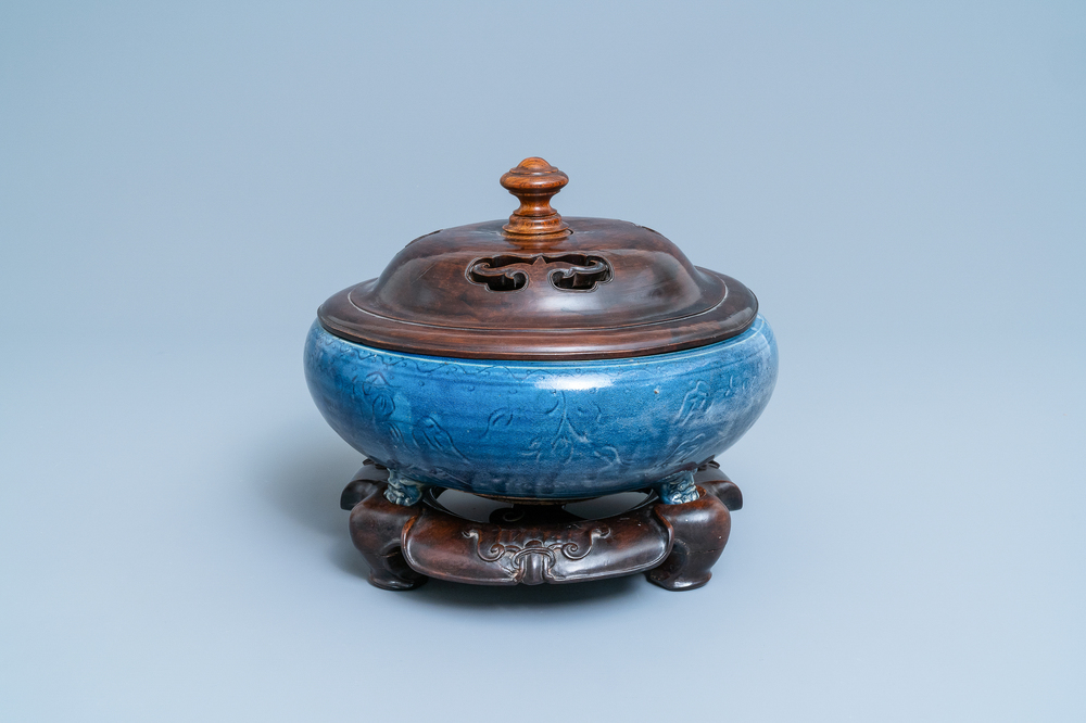 A Chinese monochrome blue censer with incised floral design, Ming