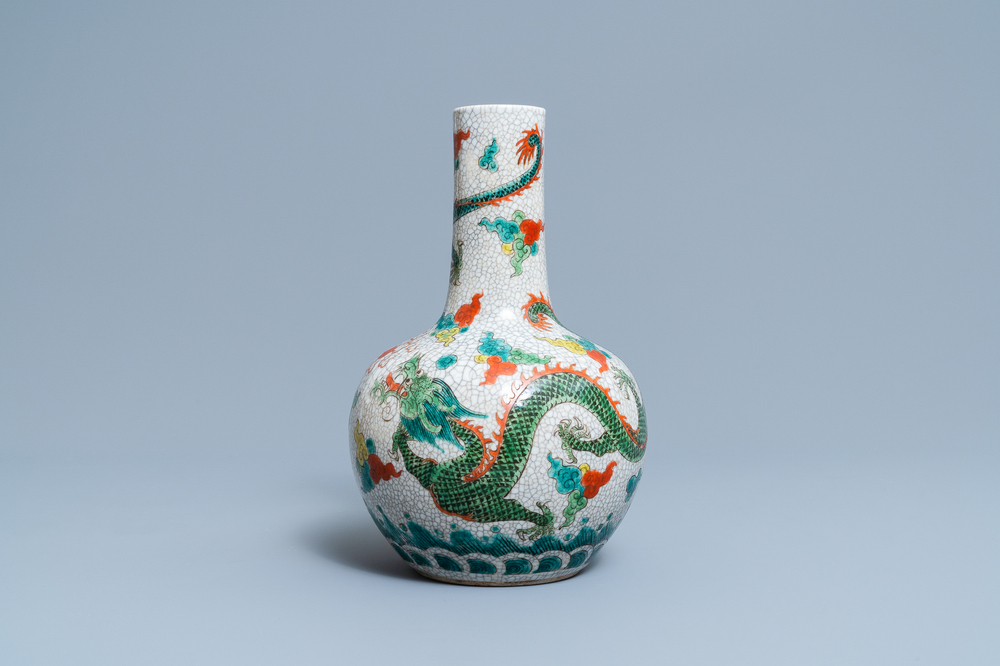 A Chinese famille verte 'dragon' bottle vase, 19/20th C.