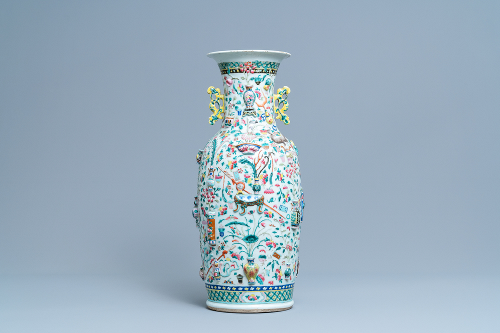 A Chinese relief-moulded famille rose 'antiquities' vase, 19th C.