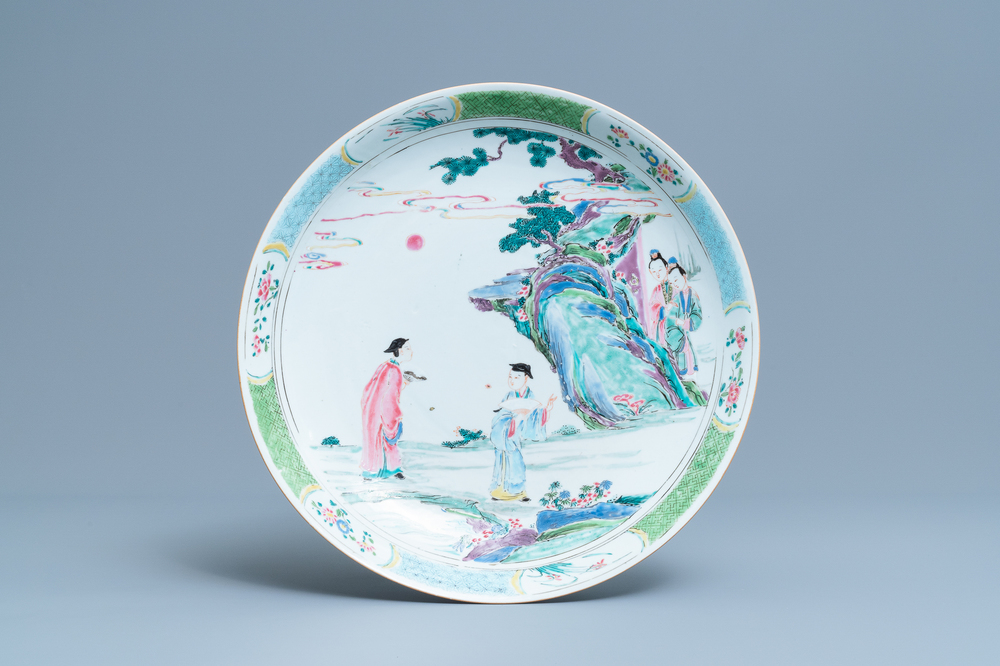A Chinese famille rose charger with figures in a landscape, Yongzheng