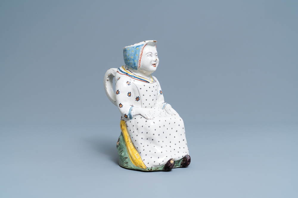A polychrome Lille faience 'Jacqueline' jug, France, 2nd half 18th C.