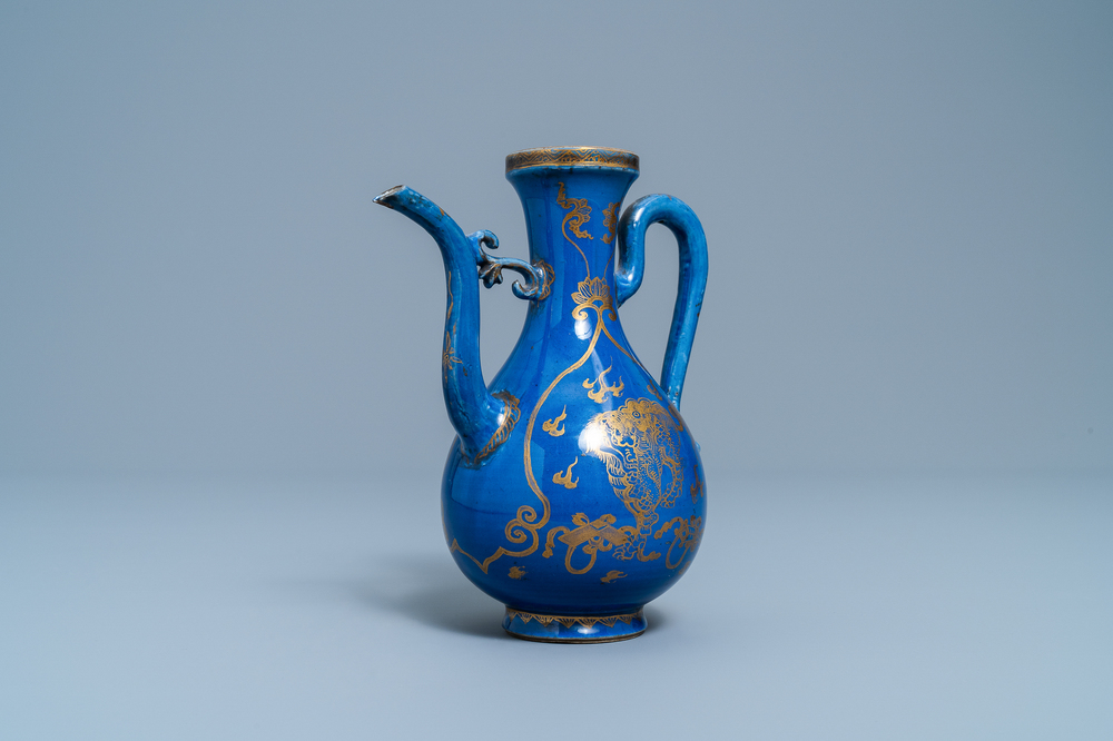 A Chinese gilt-decorated powder blue-ground jug with mythical beasts, Kangxi