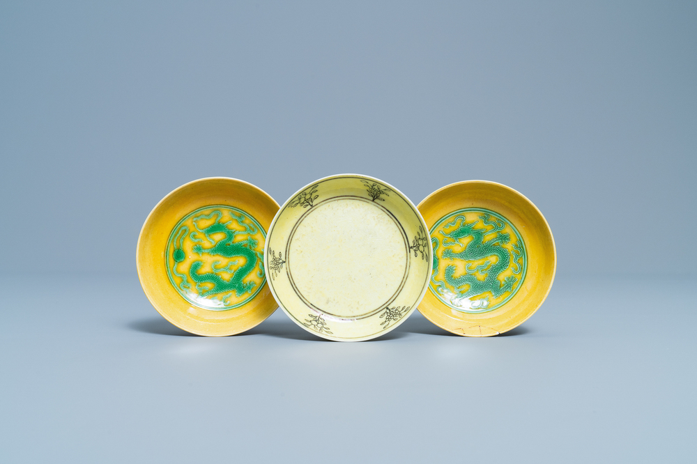 Three Chinese yellow-ground saucer dishes, 19/20th C.