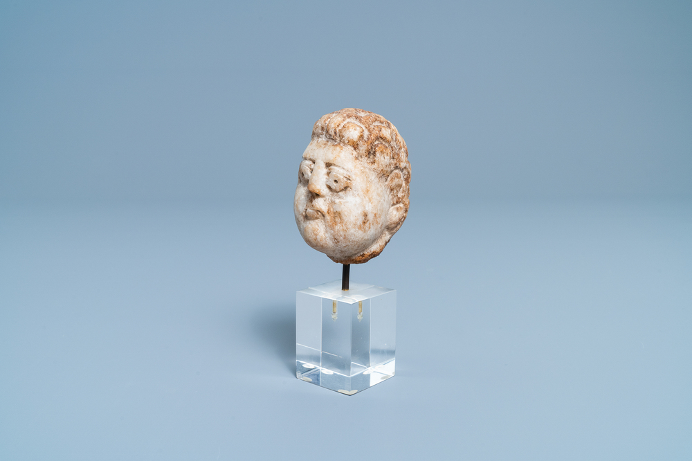 A Romanesque marble head of a man, 14/15th C.