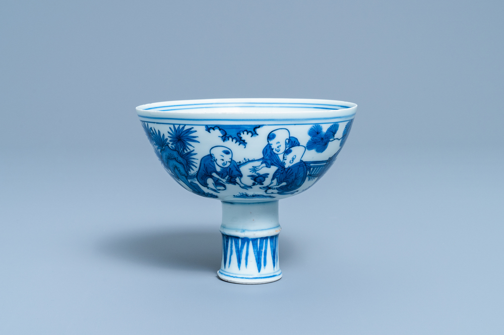 A Chinese blue and white 'playing boys' stem cup, Wanli