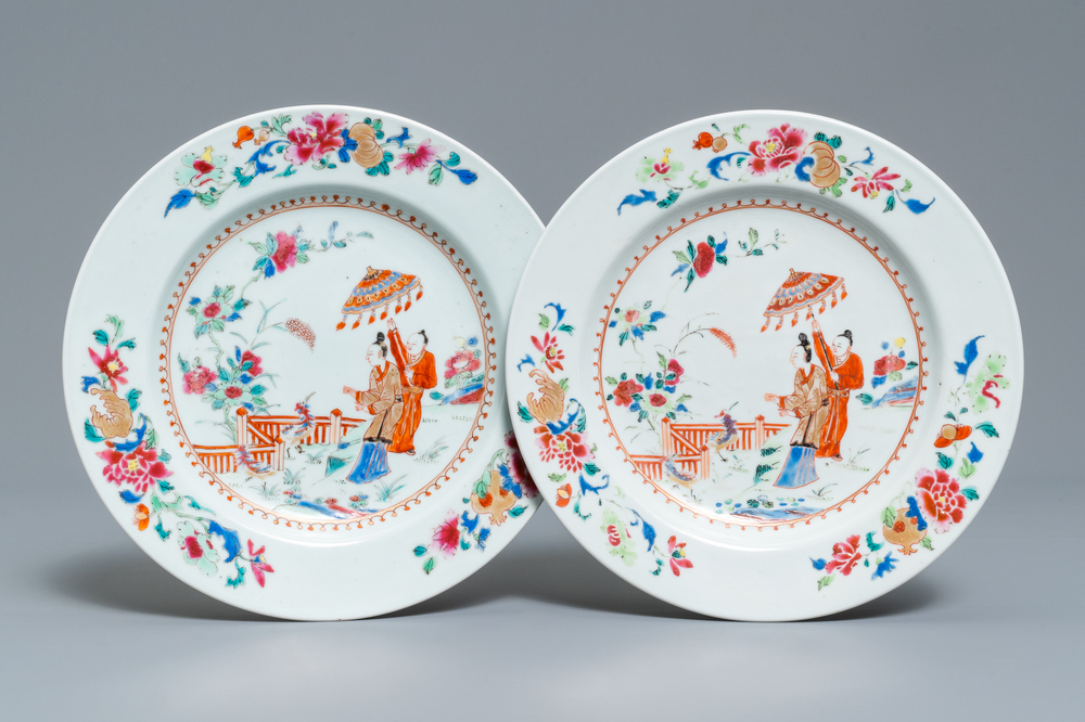 A pair of Chinese famille rose plates after Cornelis Pronk: 'Dames au parasol', Qianlong